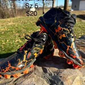 Under Armour Black and Orange Cleats